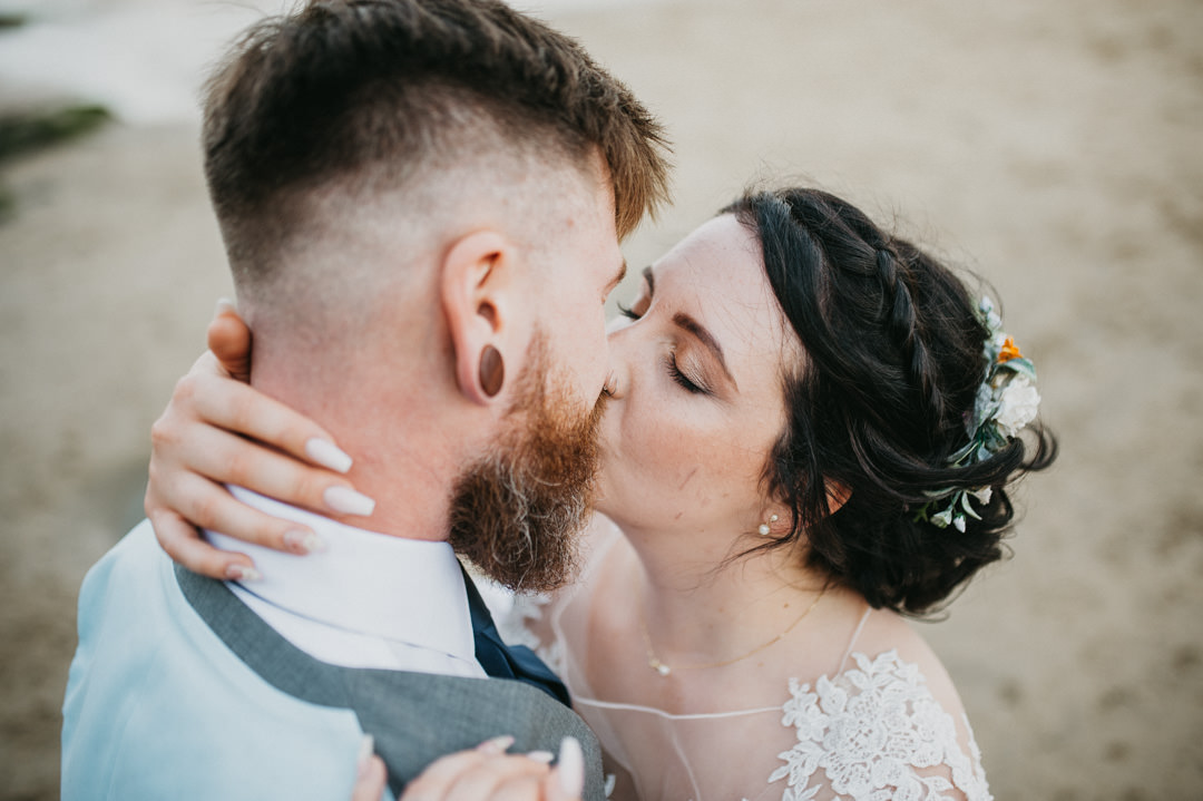 bride and groom kissing